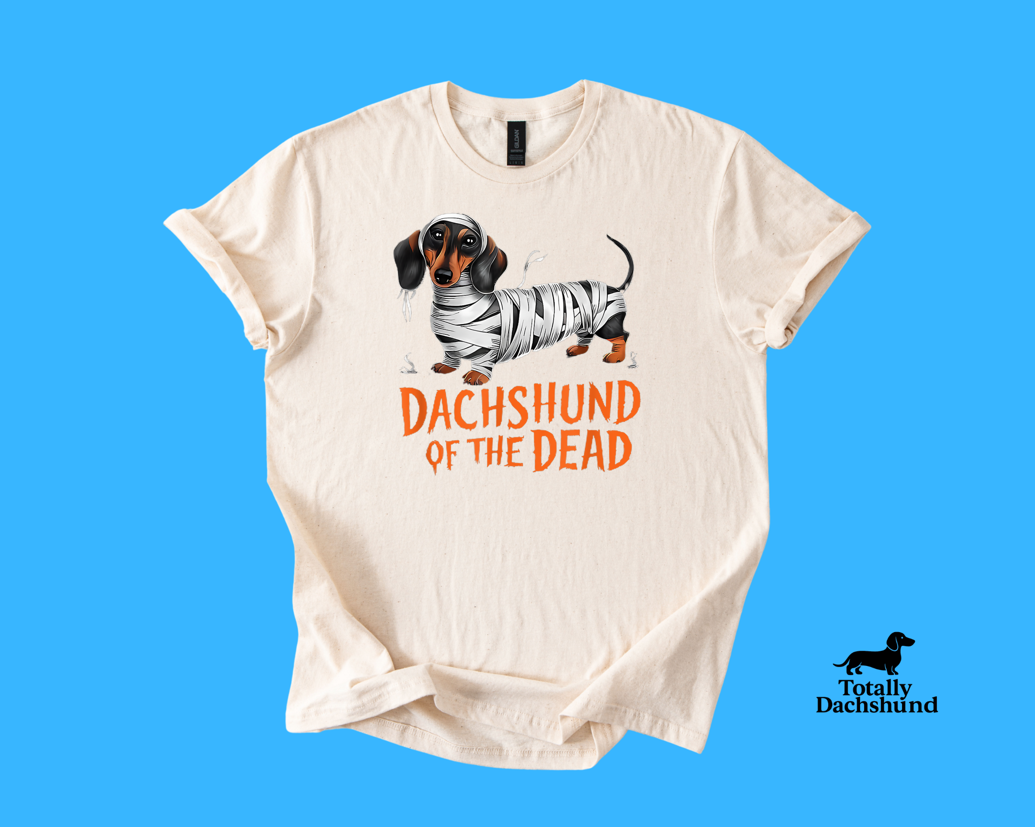 white tee with mummy dachshund design